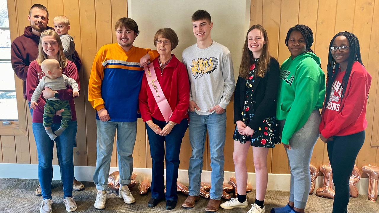 Mary Larson with grandchildren and great-grandchildren